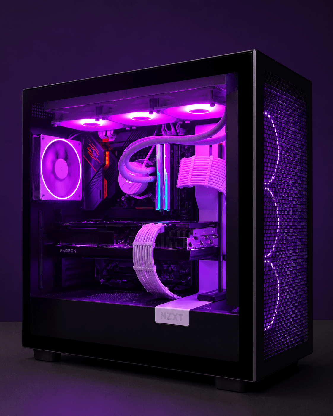 Black NZXT gaming PC with purple lighting, white cable extensions, top-mounted liquid cooler, and Radeon graphics card